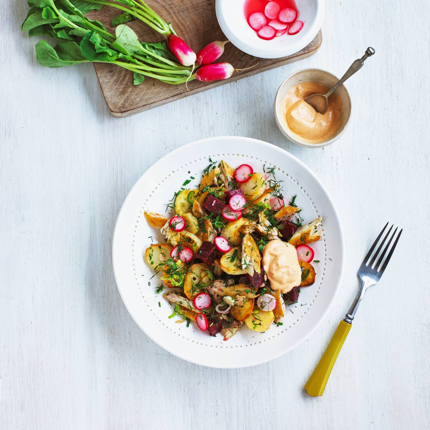 Mackerel potato hash with harissa lemon yogurt