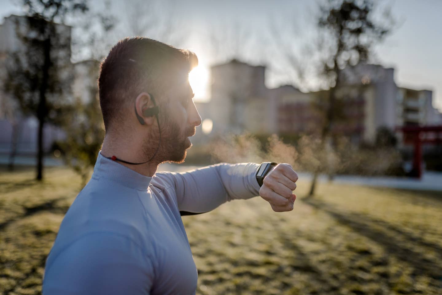 Runner checking heart rate after jogRunner checking heart rate after jog