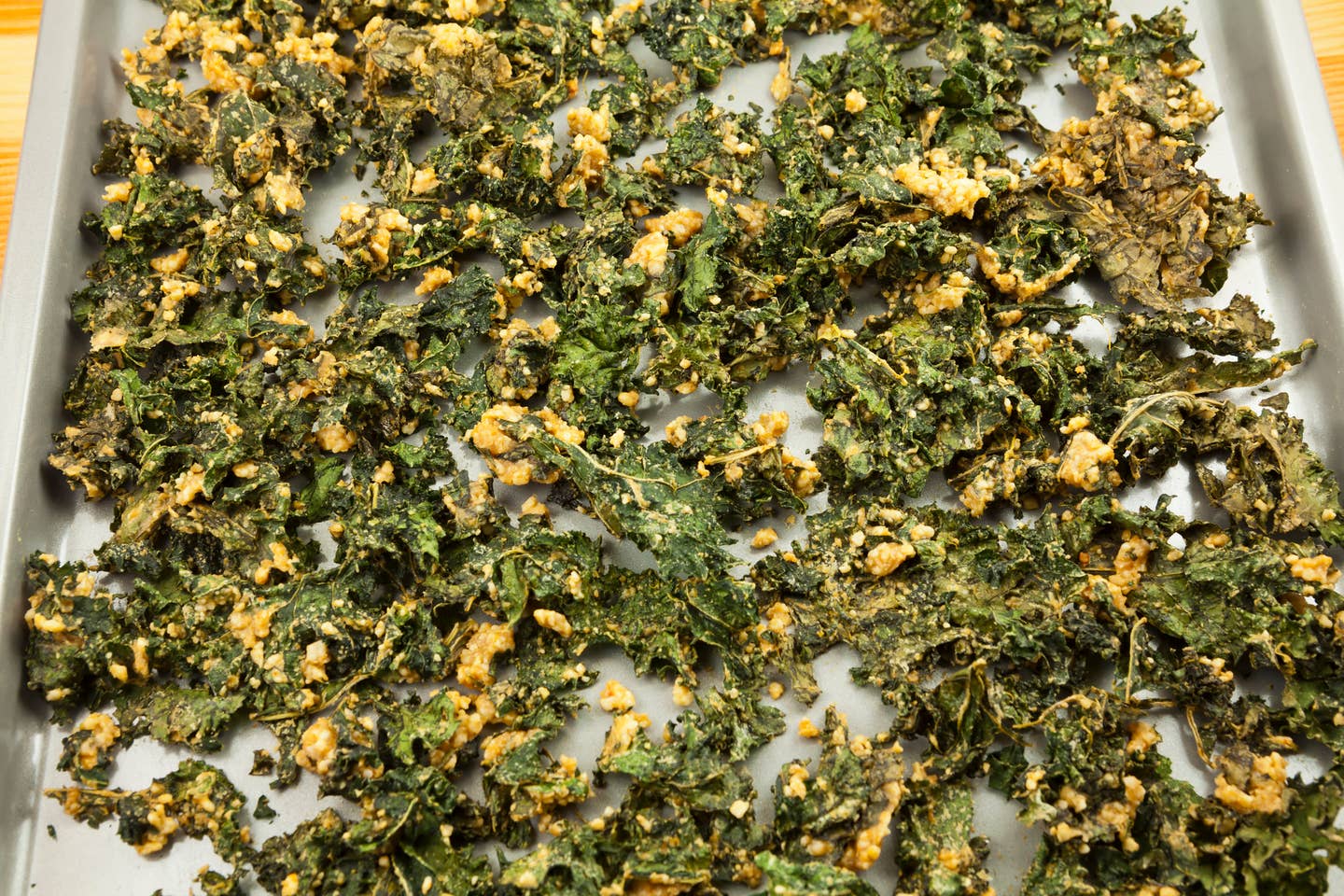 Kale chips on a baking sheet