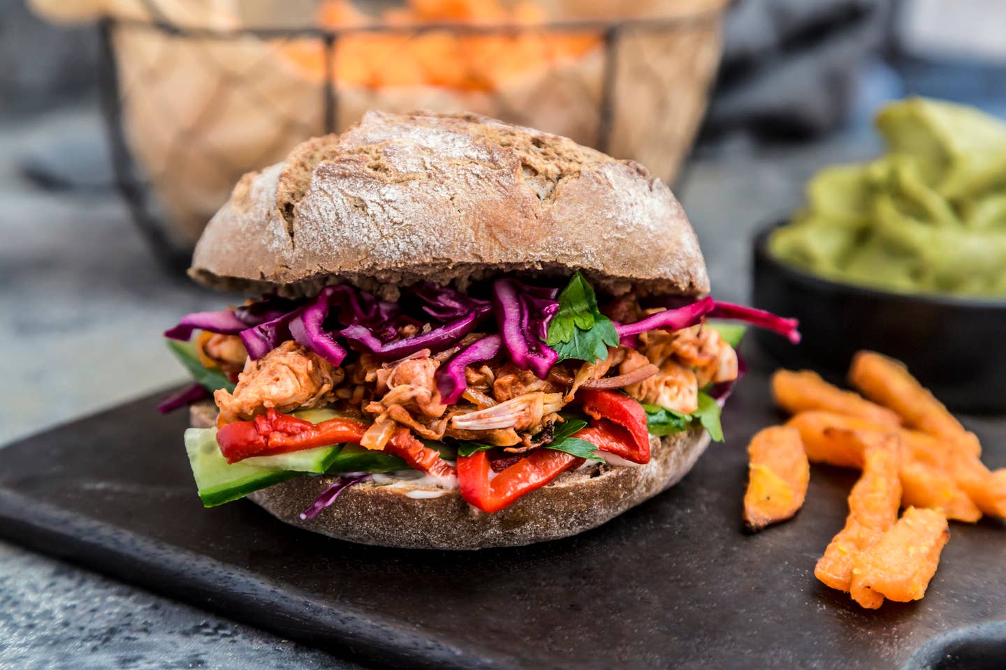 Pulled pork jackfruit burger, jackfruit, red cabbage, cucumber, paprika, parsley